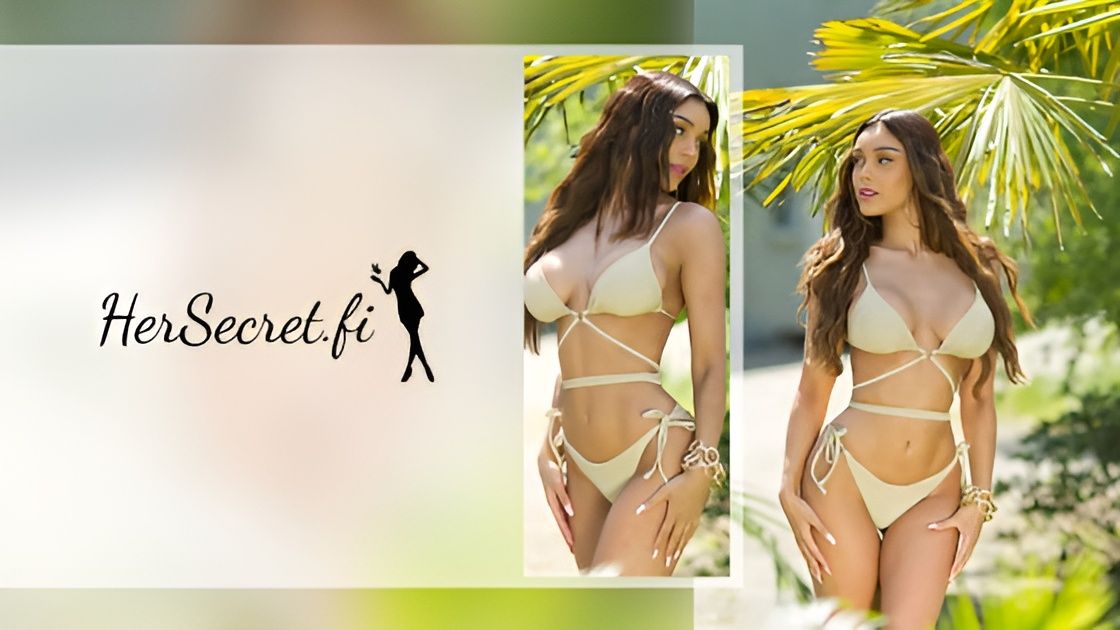 A beautiful Brunette Woman wearing a cute beige bikini, standing under a palm tree.